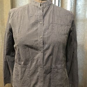 Button up blouse could be worn as a light jacket.